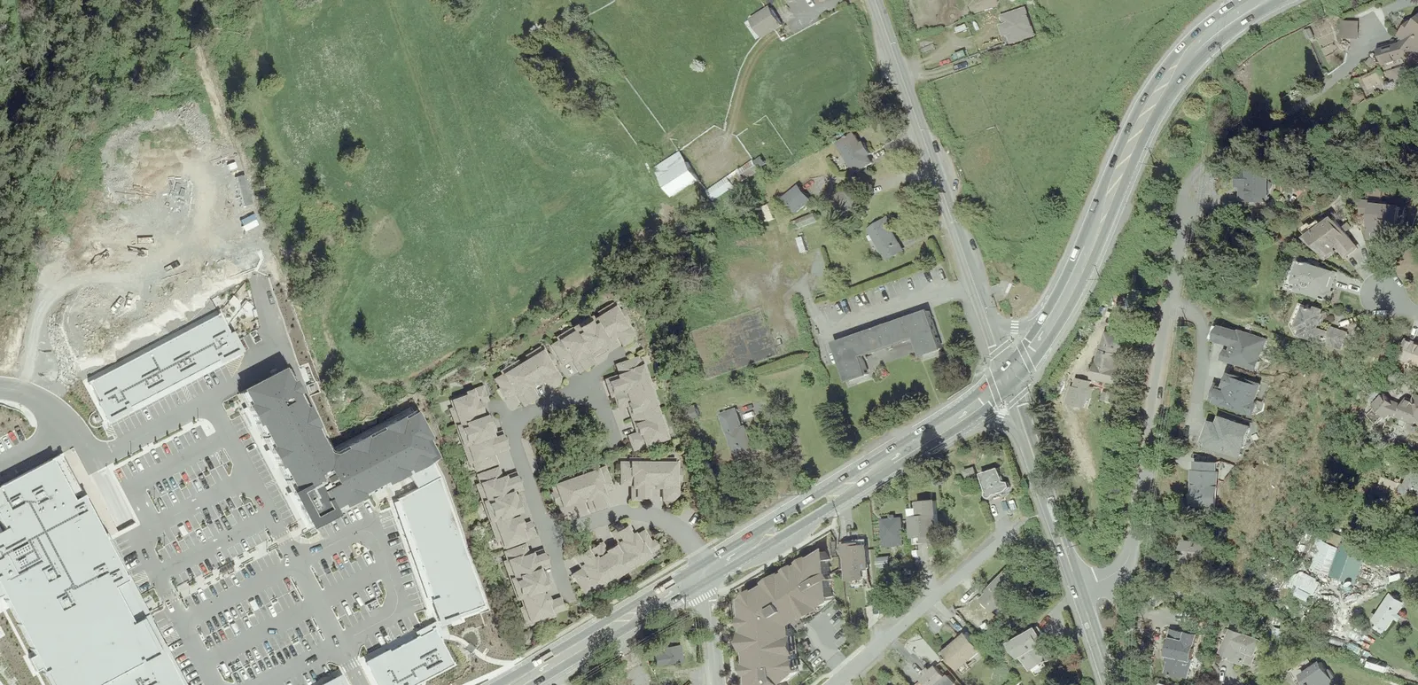 Full aerial perspective rendering of the development within the existing urban context