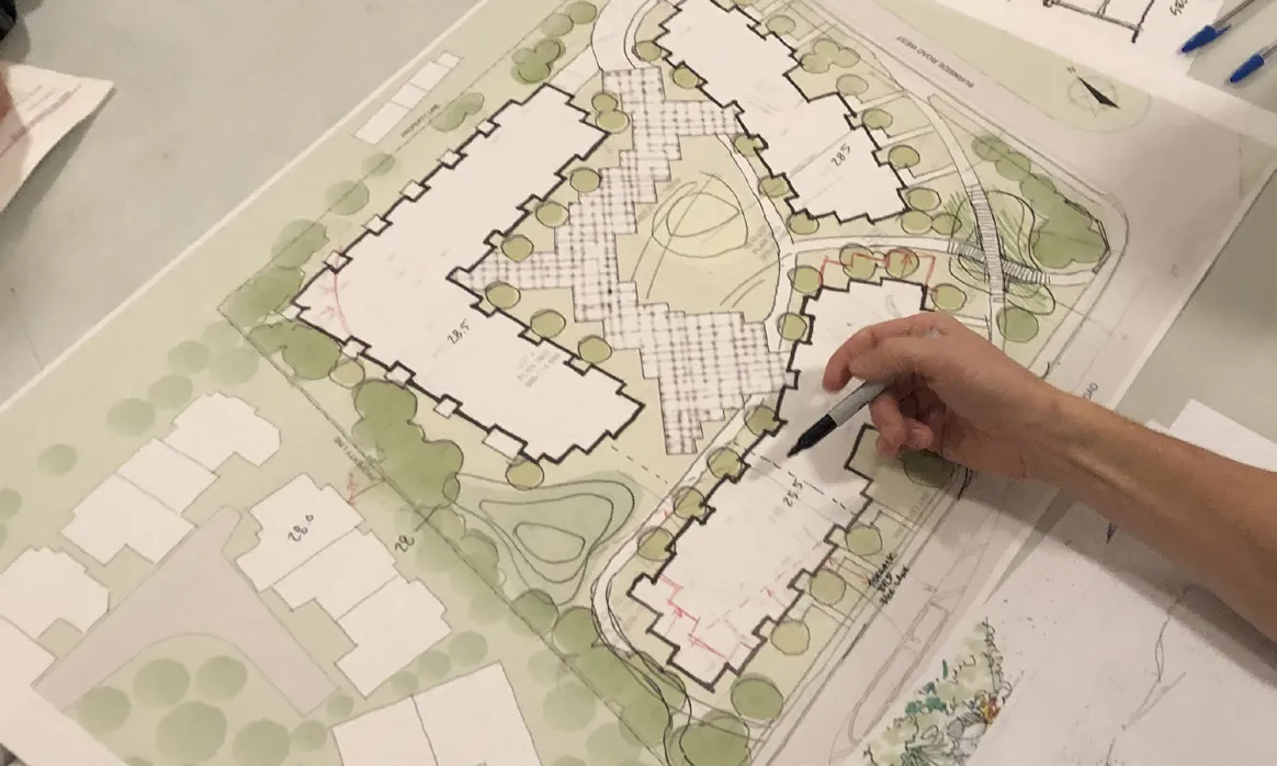 Diagram of Site Plan Version 2 showing revised building configurations with heights ranging from 3 to 6 storeys.