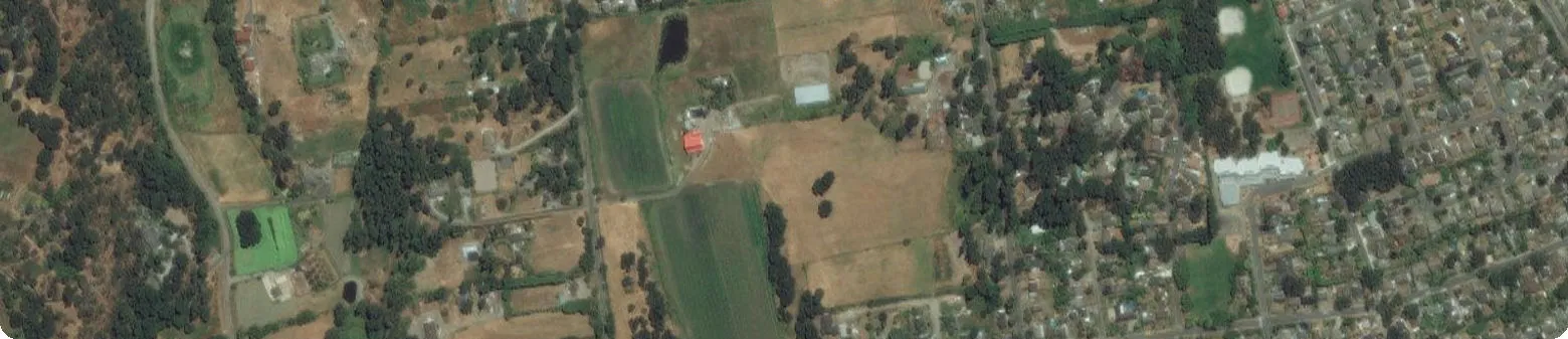 Strip of aerial photo showing northern area and roads