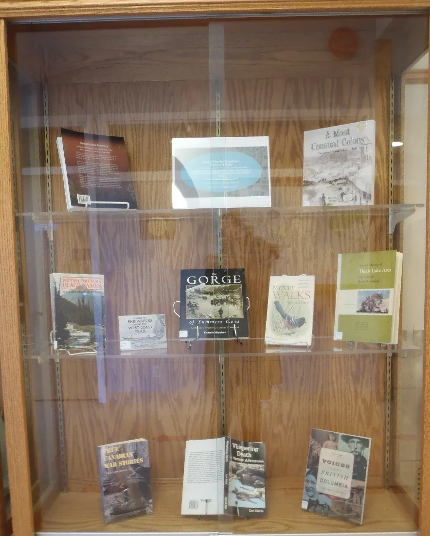 Display case containing reference books from the Archives' library
