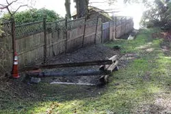 A new rock mortar headwall and renewed drainage ditch in the ROW next to 120 Chancellor Avenue
