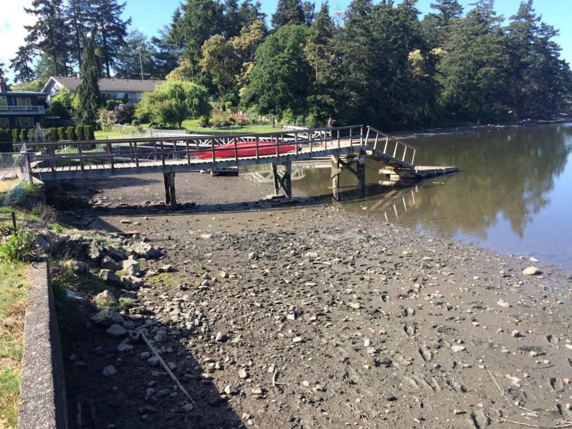 Figure 3. Location of proposed boat launch between two residential properties. View is looking North-West.