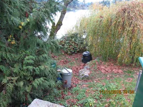 Bins and stones on public land at Murray Drive