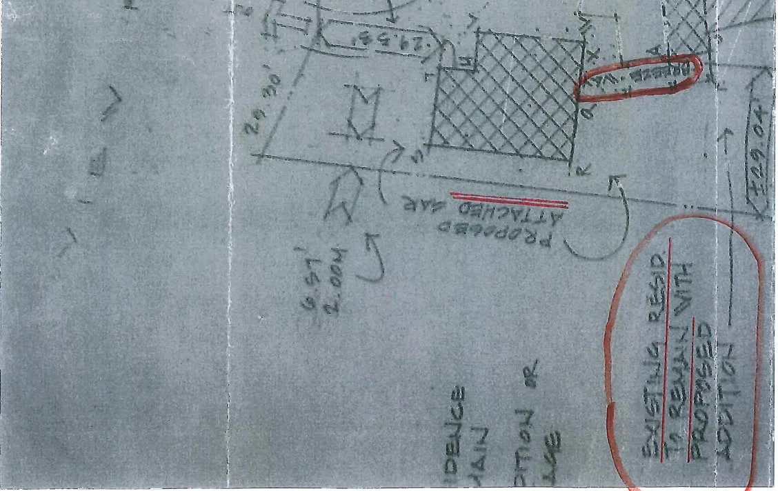 Annotated hand-drawn site plan showing 'PROPOSED ATTACHED GAR' and 'EXISTING RESID. TO REMAIN'