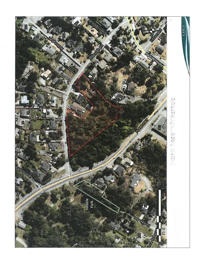 Aerial orthophoto map showing the subject property at 14 Jedburgh Rd outlined in red. The map includes surrounding streets such as Jedburgh Rd, Island Hwy, Burnett Rd, and Heddle Ave, as well as Heddle Park.