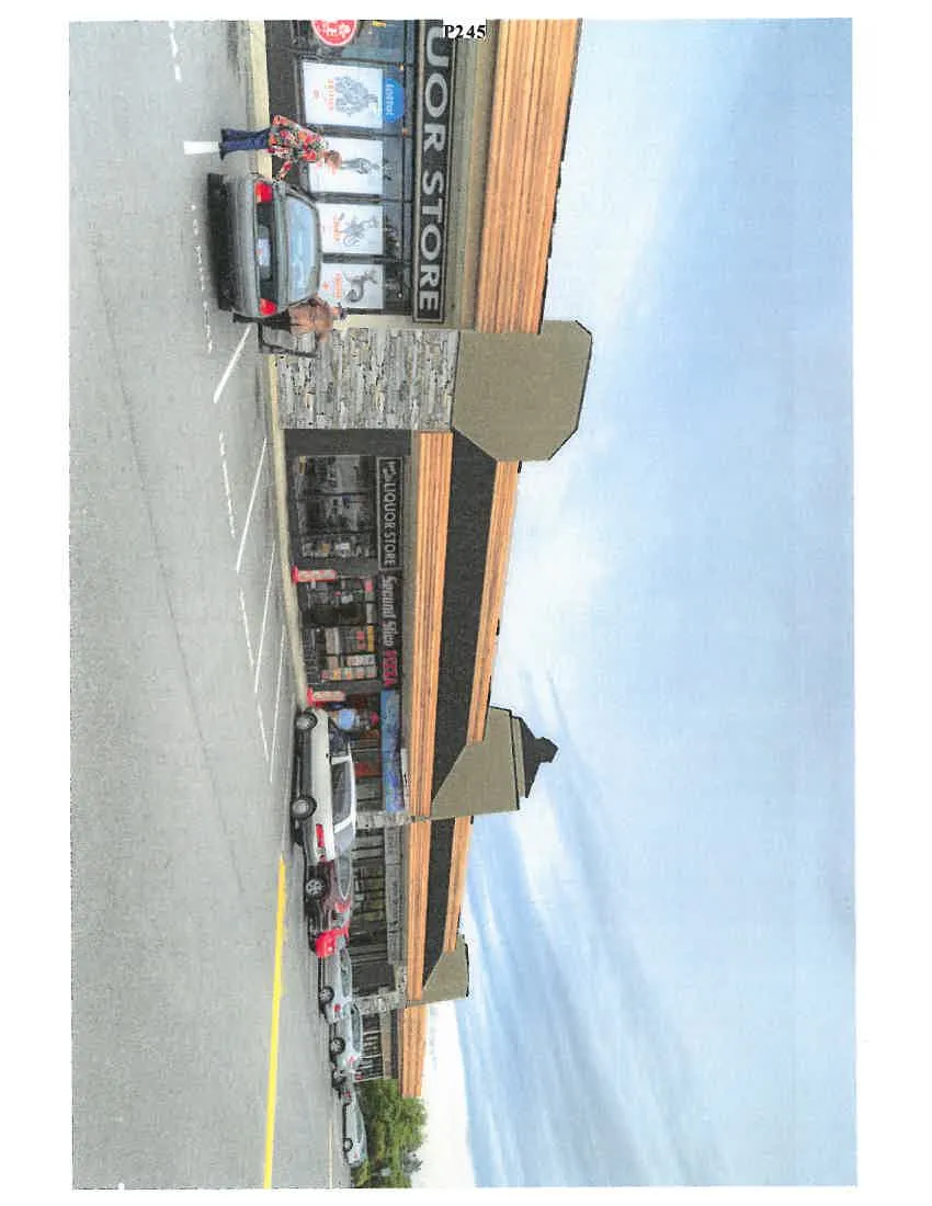 Photograph of commercial building with Four Mile Liquor Store and Second Slice Pizza storefronts