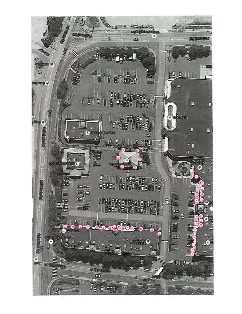 Aerial view of the shopping center showing numbered locations from 1 to 40 for building signage.