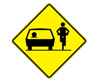 Yellow diamond warning sign depicting a car and a cyclist