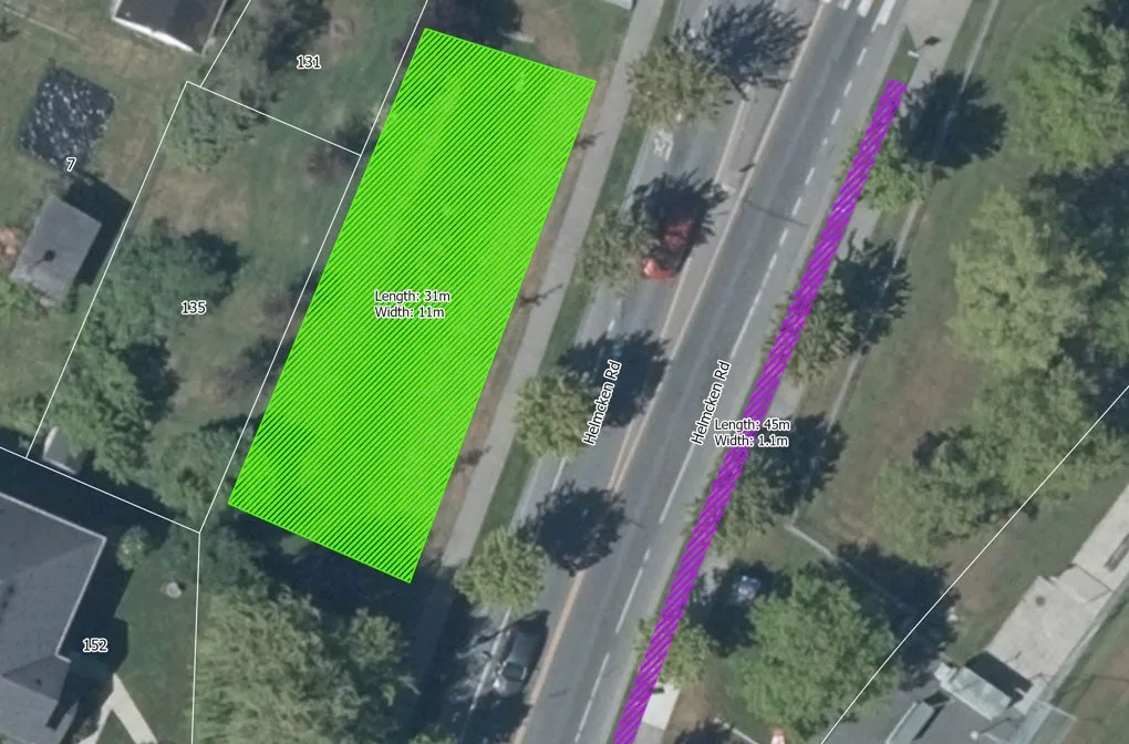 Aerial view of a large sign zone and a small sign zone on Helmcken Road at Centennial Park