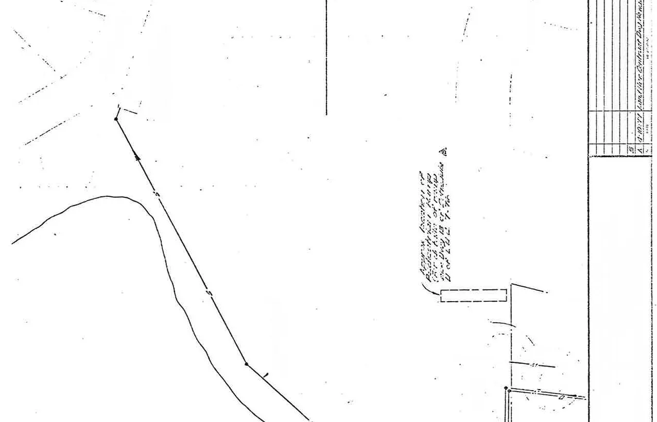 Detail showing the location note for a pedestrian ramp and the top of the revision table