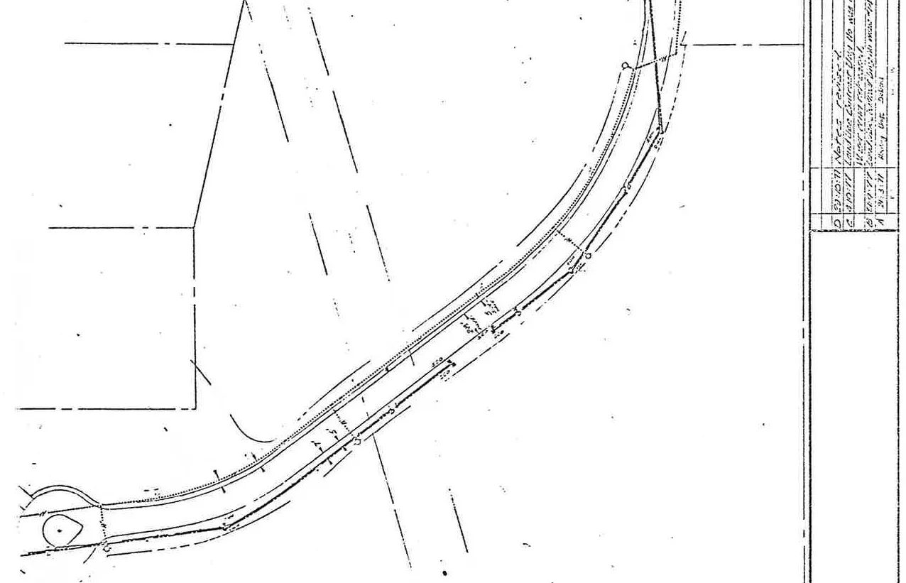 Plan view showing underground service layout along the main curved access road