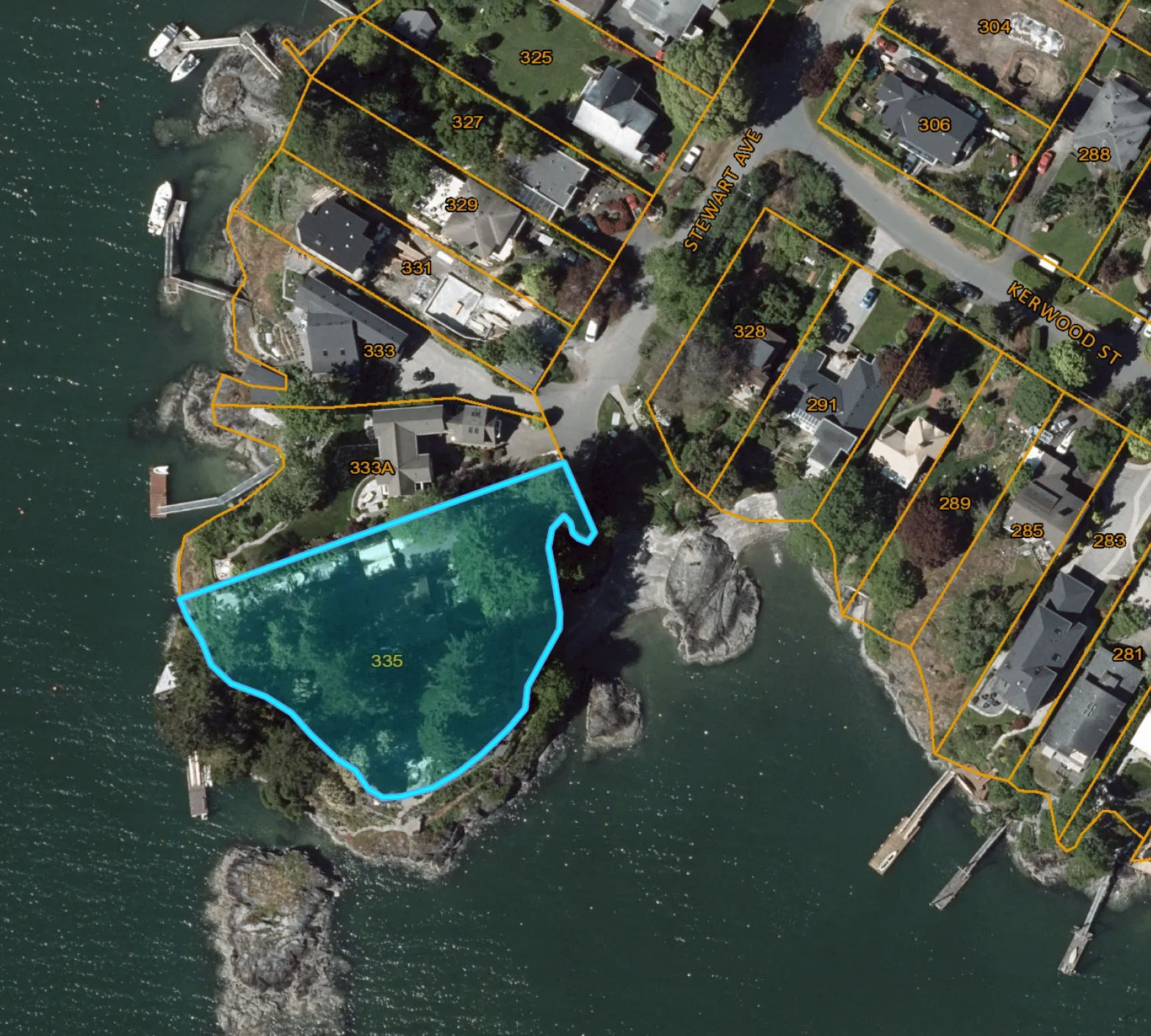 Aerial map showing the highlighted property boundary for 335 Stewart Avenue and the surrounding neighborhood
