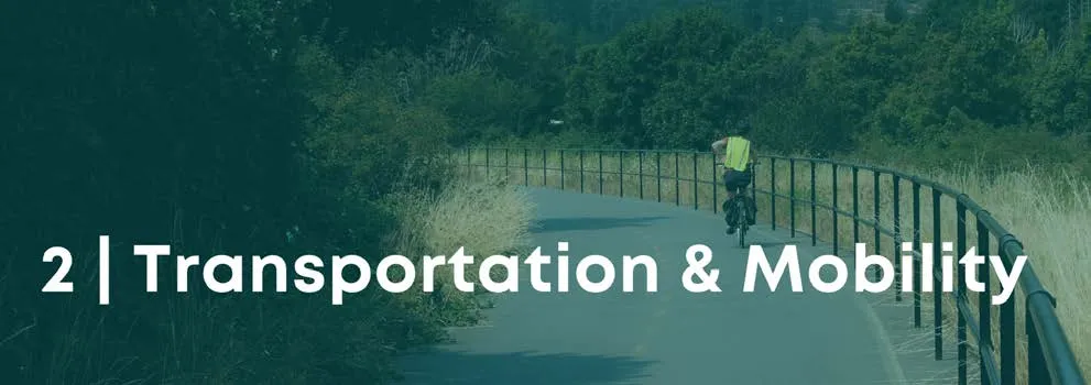 A cyclist riding along a paved trail with a green banner overlay reading "2 | Transportation & Mobility"