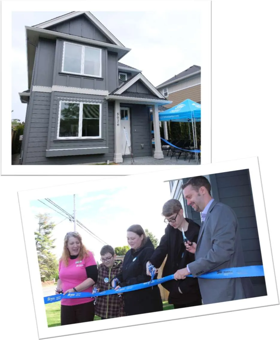 Photo of a completed grey duplex/triplex building