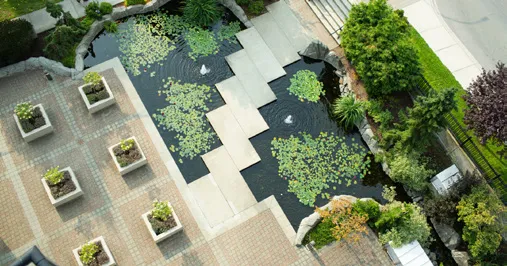 Top-down view of the Parkside Hotel's geometric koi pond and gardens