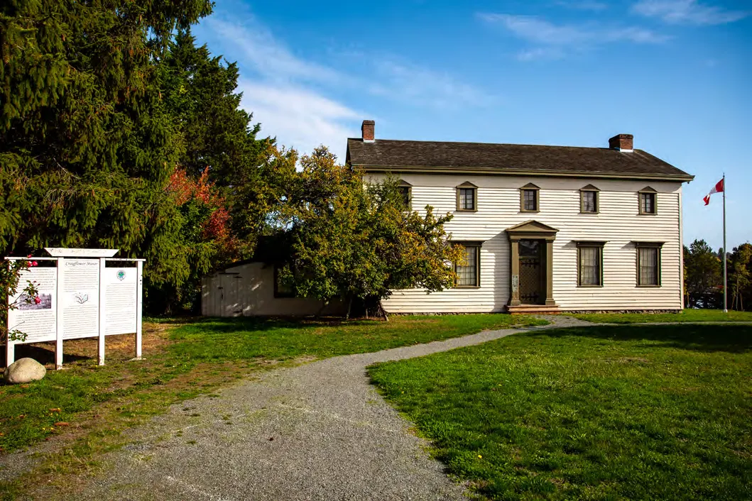 Craigflower Manor, a historic two-story white house.