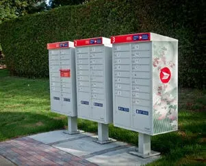 Community mailboxes near a green hedge
