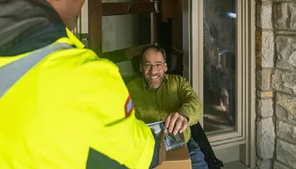 Person sliding out a compartment tray