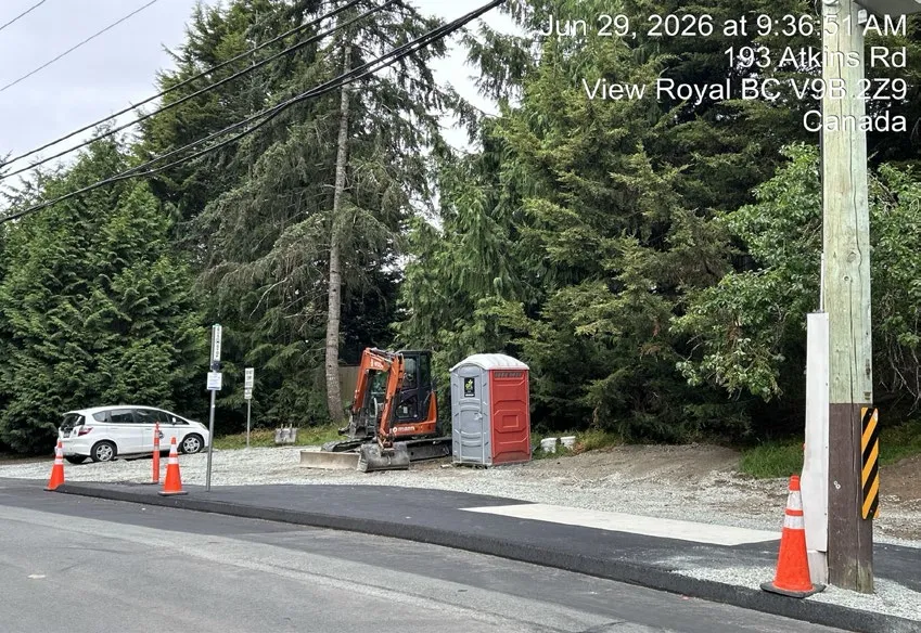 Second bus pad installation at a transit stop within Atkins Road Sidewalk Project Area