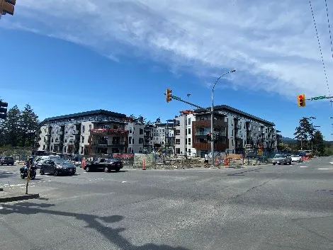 Photograph of the completed multi-unit residential buildings at 1449 Burnside Rd W