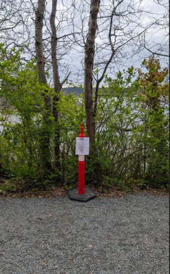 Public warning sign for the algae bloom posted in Portage Park