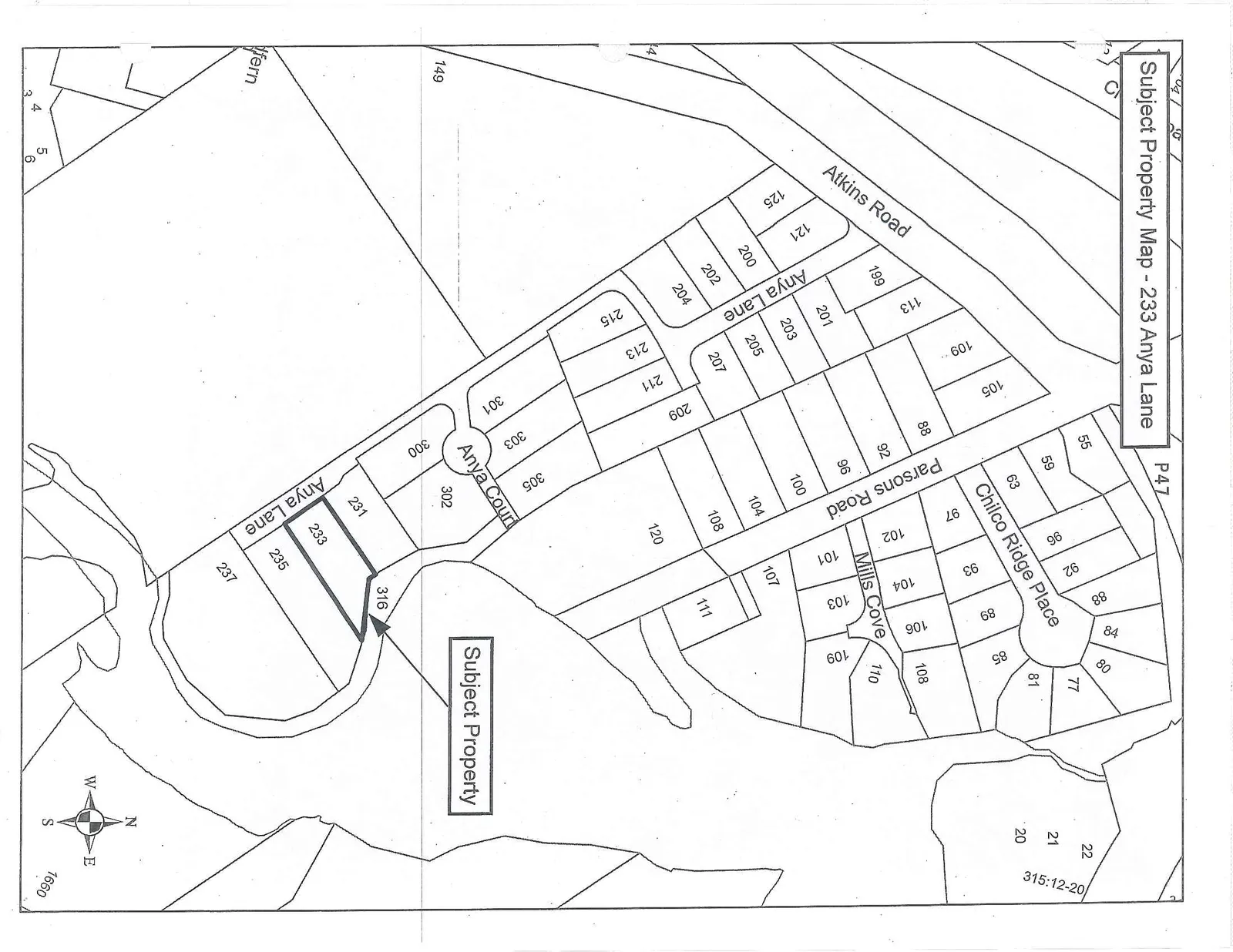 A residential subdivision map showing lot parcels. The "Subject Property" at 233 Anya Lane is outlined in bold and indicated with an arrow. The map includes lot numbers and street names including Atkins Road, Anya Lane, Parsons Road, Chilco Ridge Place, Mills Cove, and Anya Court. A compass rose is located at the bottom right.
