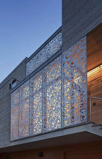 Architectural photo of decorative laser-cut metal privacy screens