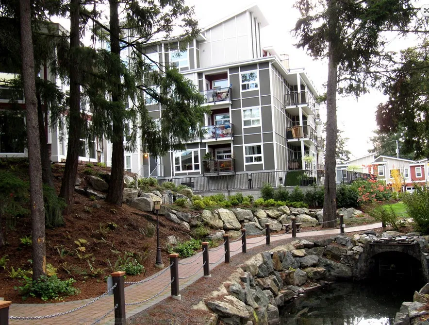 Photograph of a completed multi-story residential building