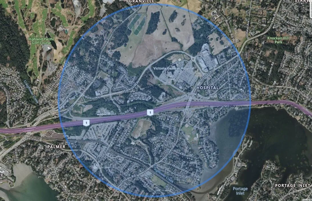 Aerial map with a circular overlay indicating a 15-minute walk radius from the project site