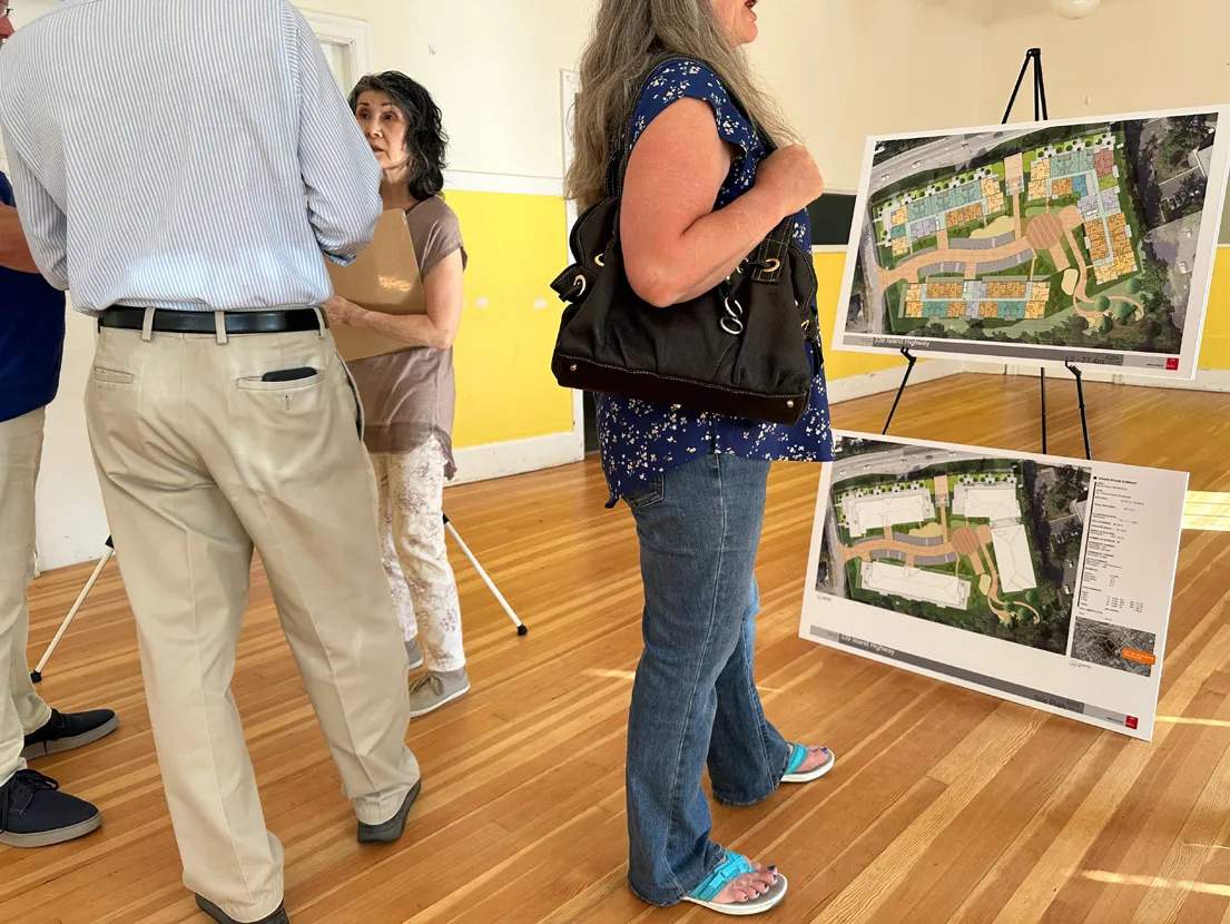 An overview of the June 2023 neighbourhood information session showing the setup and attendees.
