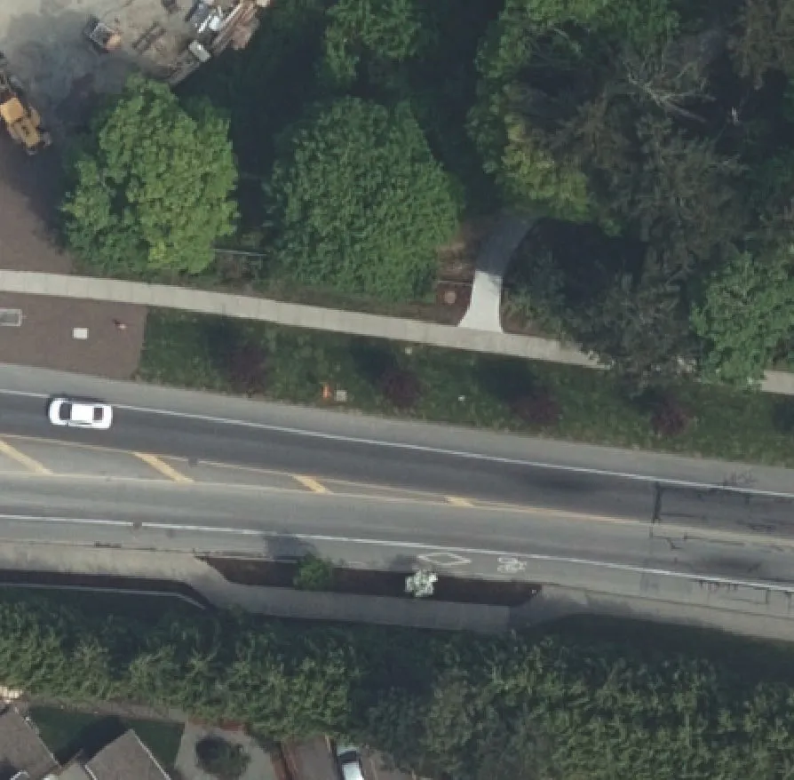 Aerial view showing the path of Shoreline Trail and its proximity to Island Highway