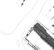 Longitudinal section through the building showing the ramp and parking levels
