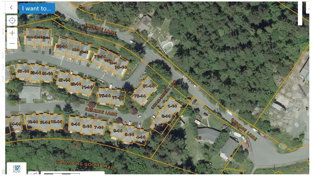 Aerial map showing property boundaries and address labels for residences along Erskine Lane and the Galloping Goose Trail. Addresses include unit numbers such as 1-14 to 14-14, 57-14 to 61-14, 62-14 to 66-14, 67-14 to 71-14, 70-14 to 76-14, 75-14 to 77-14, 79-14, and 81-14, along with larger lot numbers 7, 9, 10, and 14.