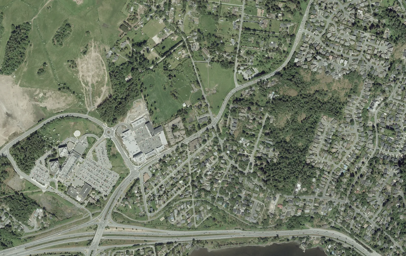 Aerial map of the neighborhood with the project site outlined in orange