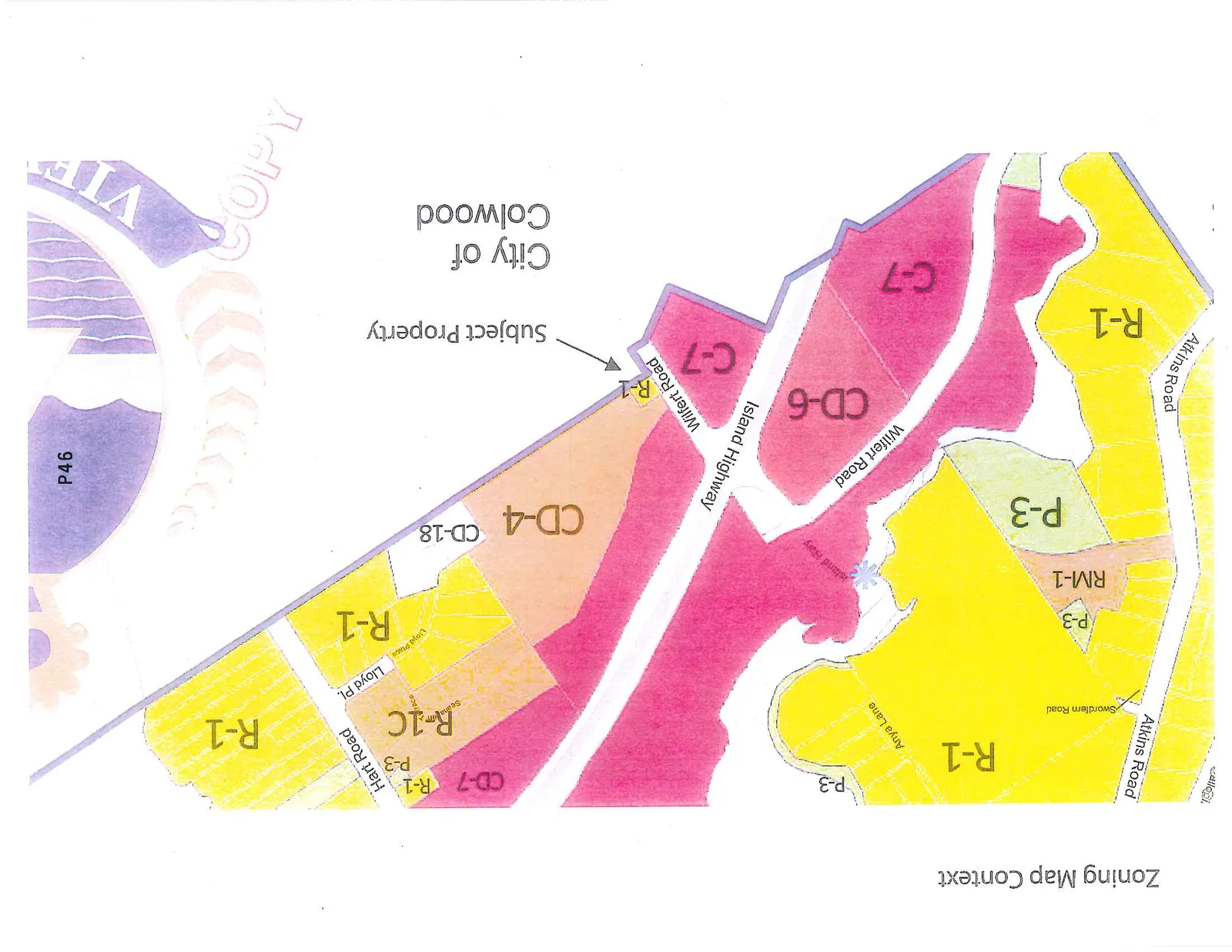 Zoning map showing various zones in the City of Colwood including R-1, P-3, RM-1, CD-6, CD-4, CD-18, C-7, R-1C, and CD-7. The map highlights the "Subject Property" as a small R-1 zoned parcel on Wilfert Road. Nearby roads include Atkins Road, Swordfern Road, Anya Lane, Wilfert Road, Island Highway, Hart Road, and Lloyd Pl.
