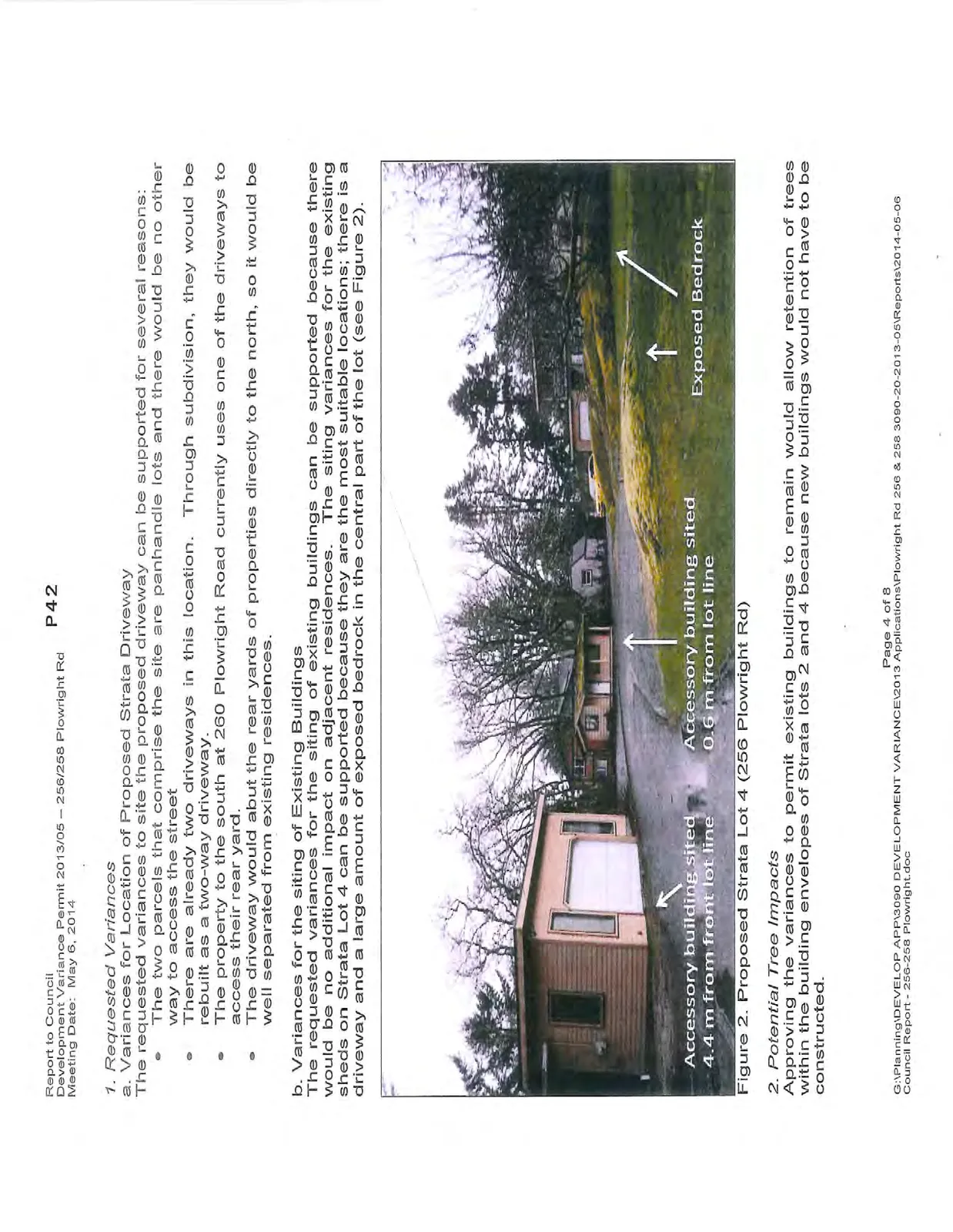 Figure 2 photograph of proposed Strata Lot 4 showing two accessory buildings and an area of exposed bedrock with arrows indicating the variance distances of 4.4 m from the front lot line and 0.6 m from the side lot line.