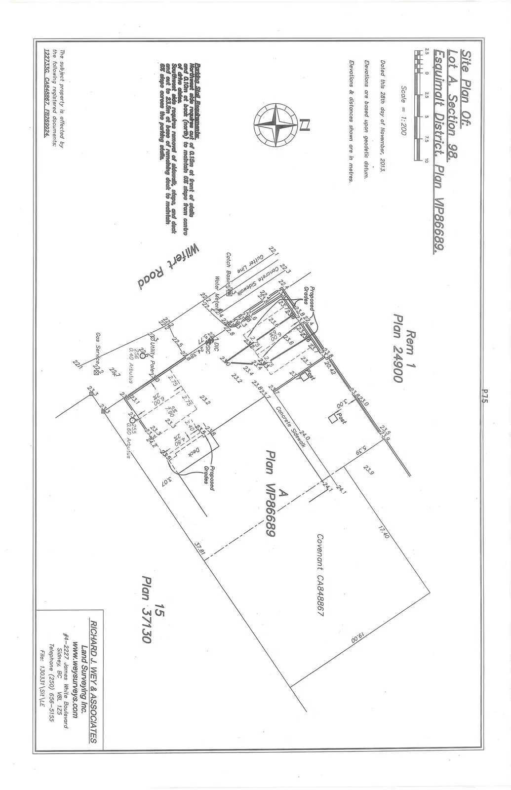 Detailed site plan showing Lot A property boundaries, proposed grades, elevations, and site features including Wilfert Road, concrete sidewalk, deck, utility poles, and adjacent properties.