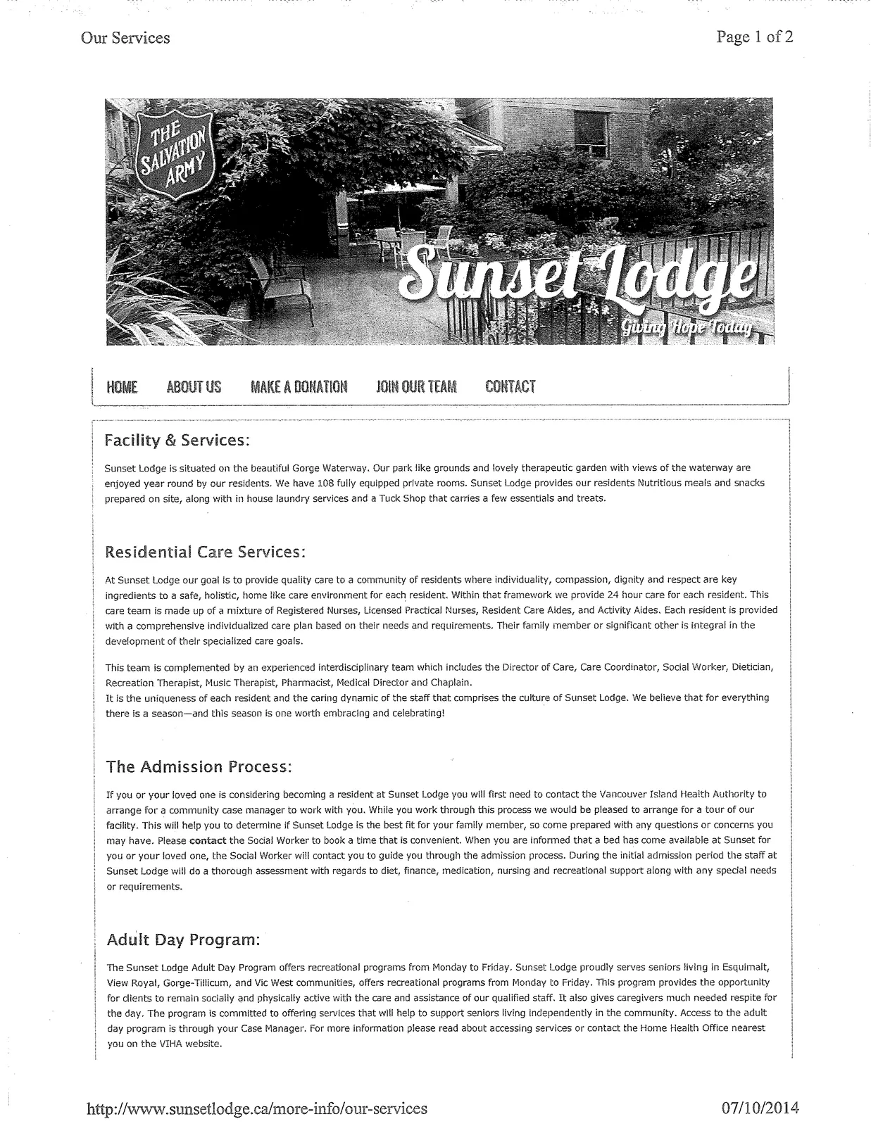 Photo of Sunset Lodge building exterior surrounded by trees and a garden