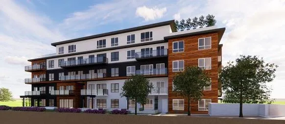 Perspective rendering of the multi-story building showing balconies, large windows, and landscaped grounds.