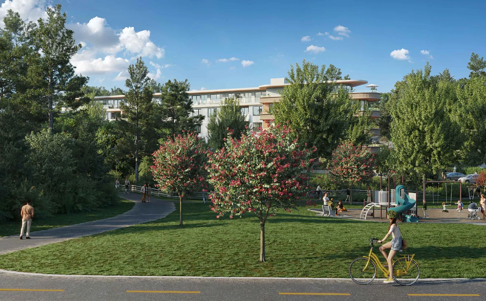 Architectural rendering showing the view of the residential building from the park, featuring a large grassy area, trees, a playground, and people walking and cycling