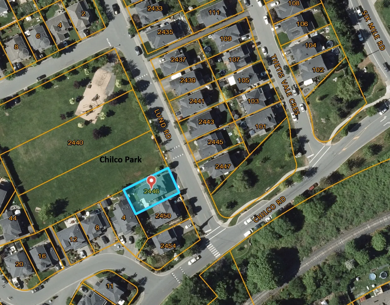 Aerial map of 2446 Lund Road and the surrounding residential area, including Chilco Park and street names such as Lund Rd, Chilco Rd, and Thetis Vale Cres. The subject property at 2446 Lund Road is highlighted with a blue border and a red marker.