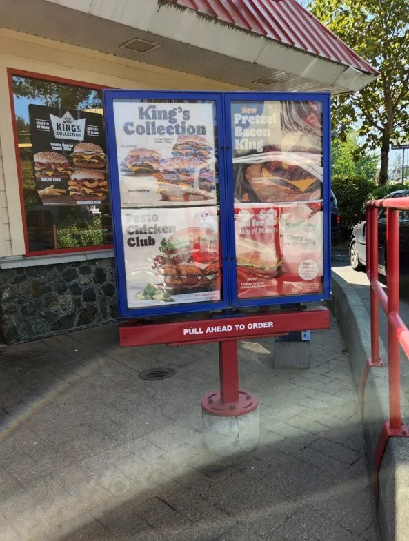Photograph of an existing "King's Collection" menu board sign