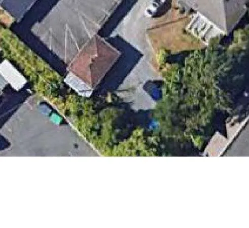 Proposed streetscape along Helmcken Road showing the townhomes integrated into the environment