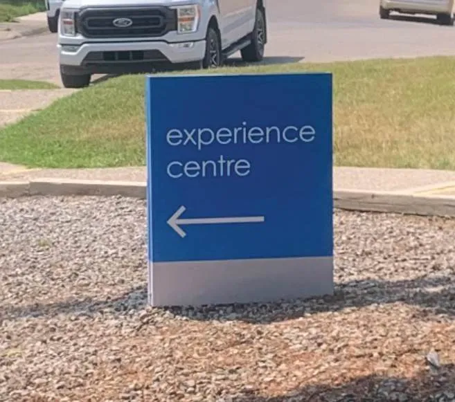 Similar sign for reference - Experience Centre directional sign