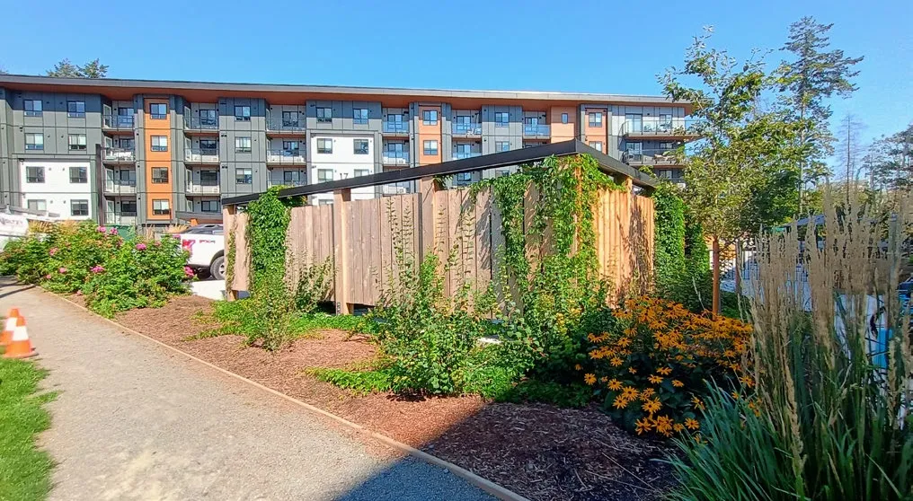 Photo of the enclosure showing integrated climbing plants