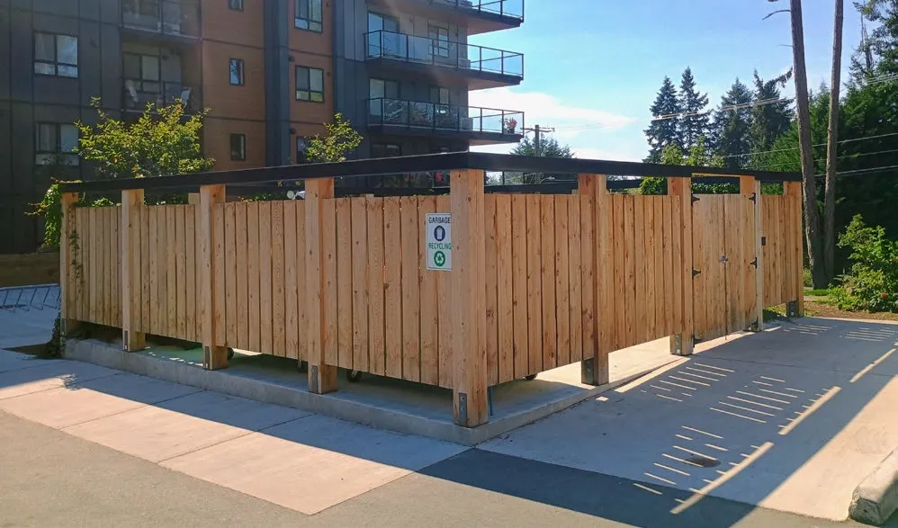 Perspective view of the wooden garbage and recycling enclosure