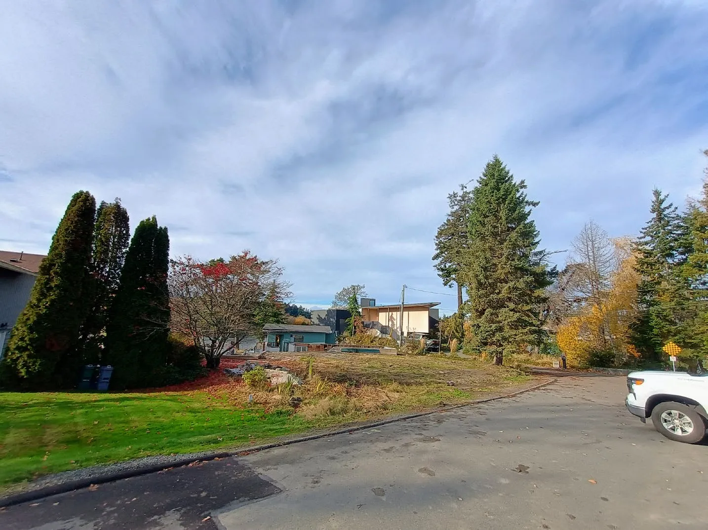 Ground-level street view of the cleared subject property on November 10, 2025