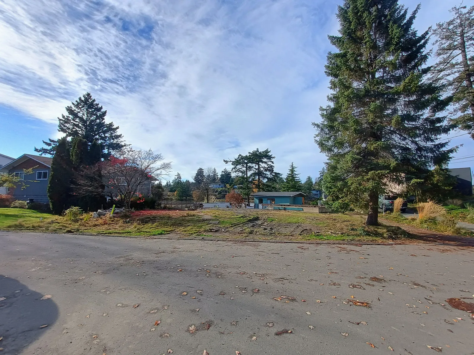Ground-level street view of the subject property on November 10, 2025, showing the property after the house was moved