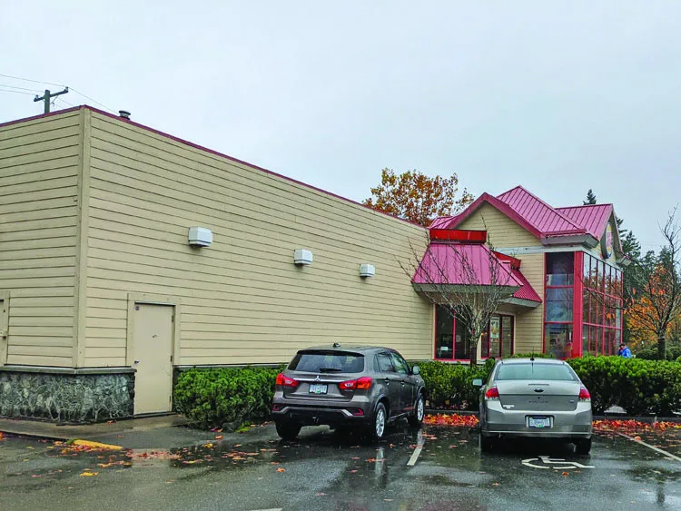 Photograph showing the existing side facade of the building