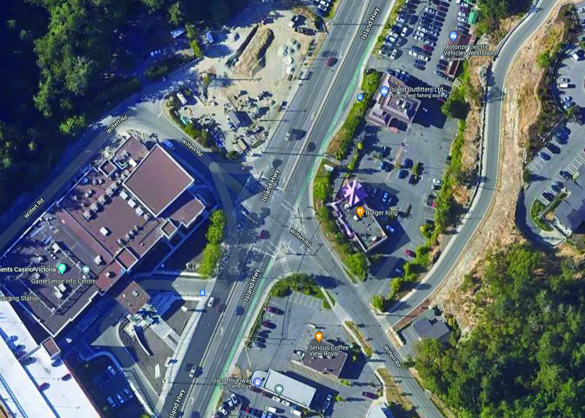 Aerial context map showing the location of the Burger King at 1681 Island Highway relative to Wilfert Road and surrounding businesses like Elements Casino Victoria, Serious Coffee View Royal, and Island Highway Automotive
